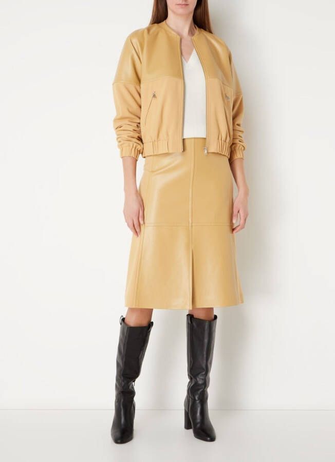 Claudia Strä, ter Midi A lijn rok van imitatieleer