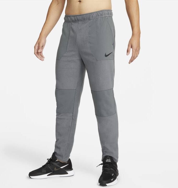 Nike Therma FIT Trainingsbroek voor de winter voor heren Grijs
